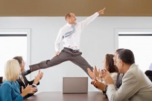 2013-10Success_guy_leaping_by_table